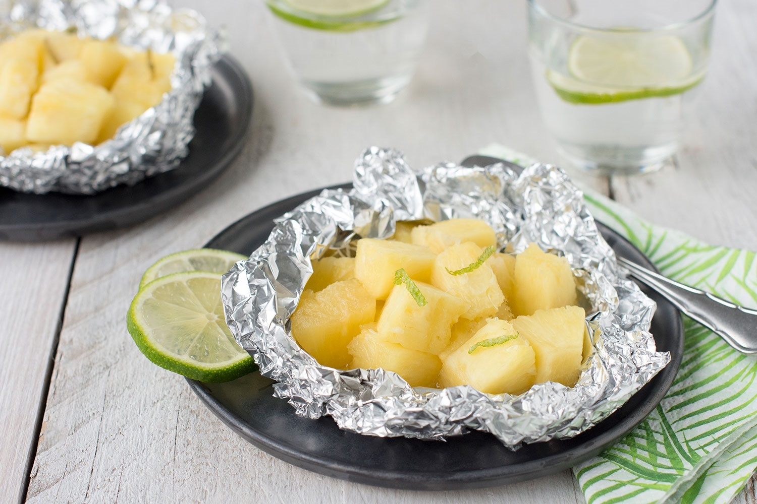 Pineapple parcels with ginger and lime on the bbq