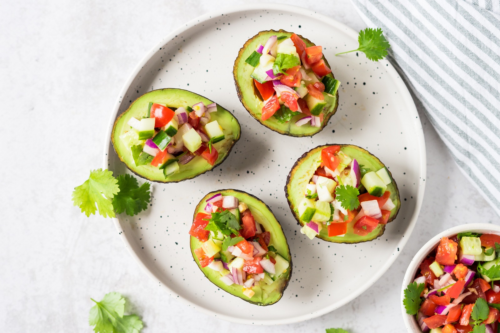 Veggipedia - Stuffed avocado patty with tomato-cucumber salsa